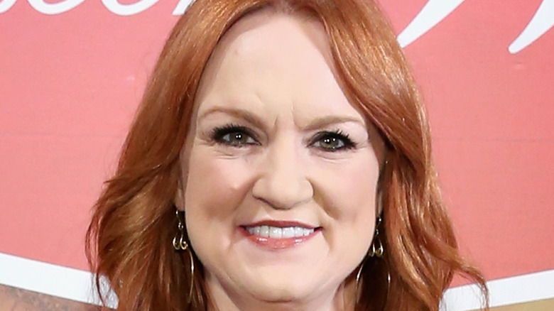 Ree Drummond smiling and posing at an event