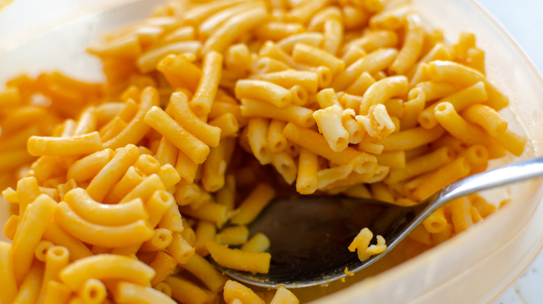 Kraft macaroni and cheese in bowl with spoon