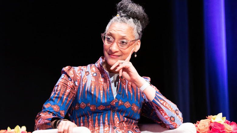 Carla Hall in a colorful outfit