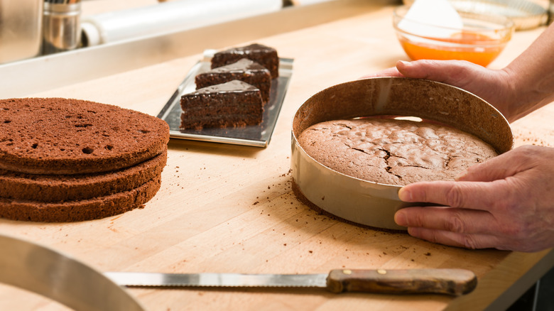cutting out round cake layers