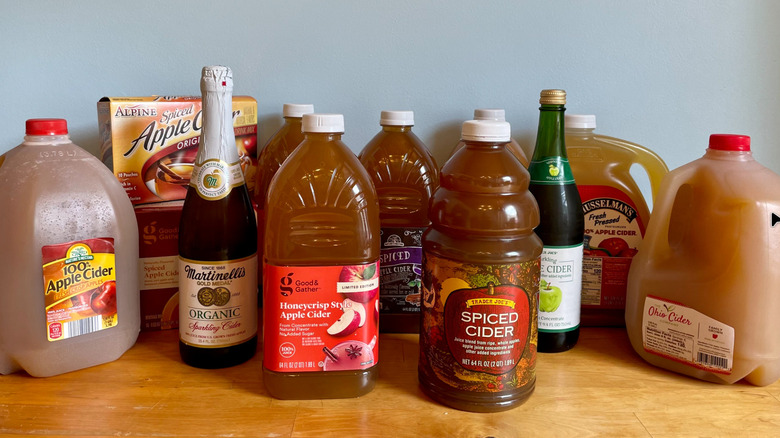 Assortment of 13 different store bought apple ciders