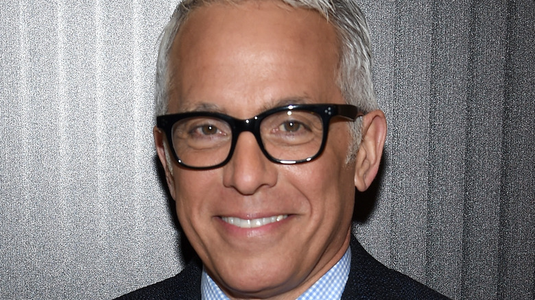 Geoffrey Zakarian smiling with glasses on