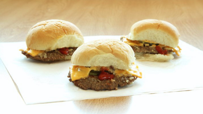 Three sliders on a paper towel