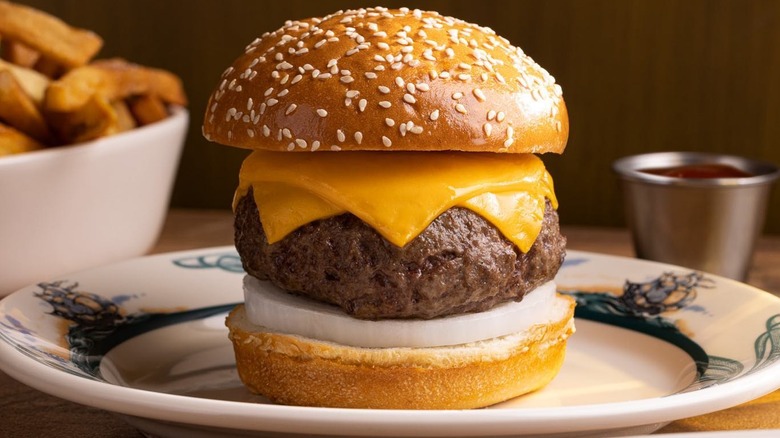 Weirdly perfect burger with cheese plated