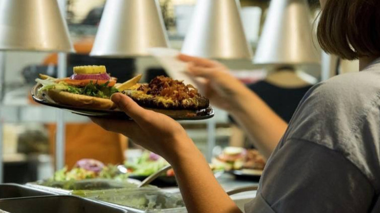 An open-faced Charburger on tray
