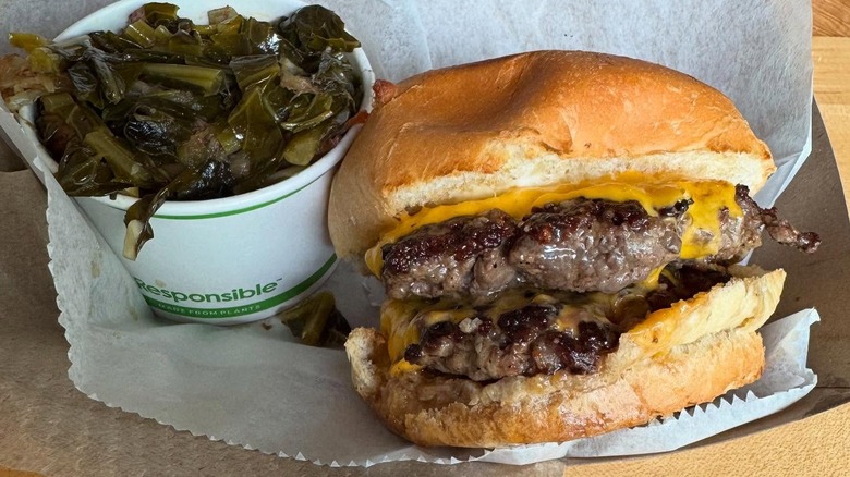 Juicy cheeseburger with greens
