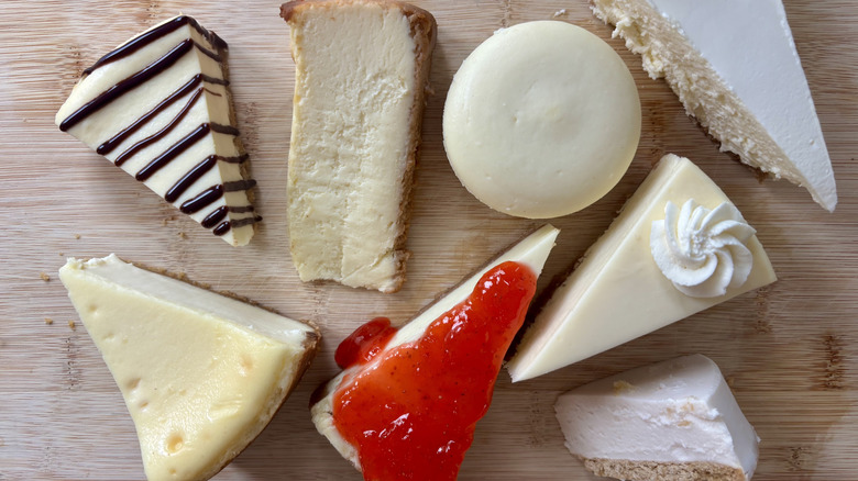 Various cheesecakes on table