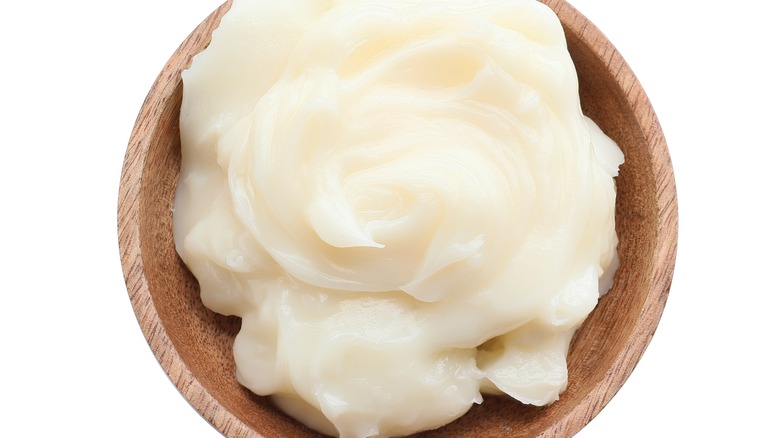 Whipped lard in a wooden bowl