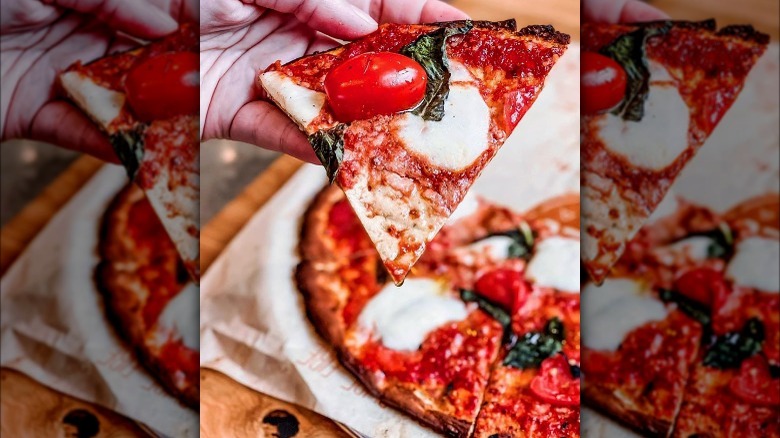 Blaze Pizza slice with tomato and cheese
