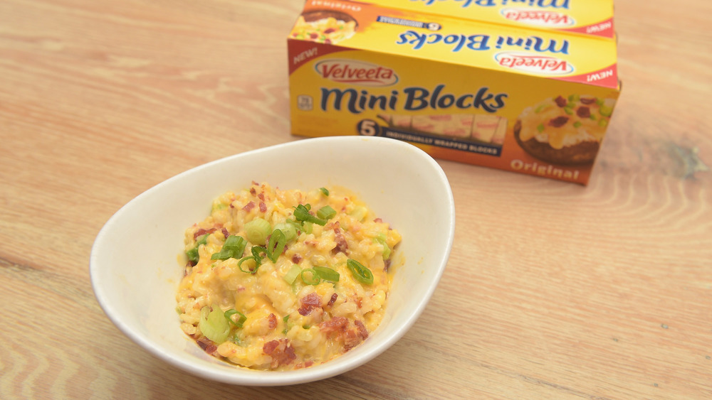 Velveeta mini blocks with a dish of pasta