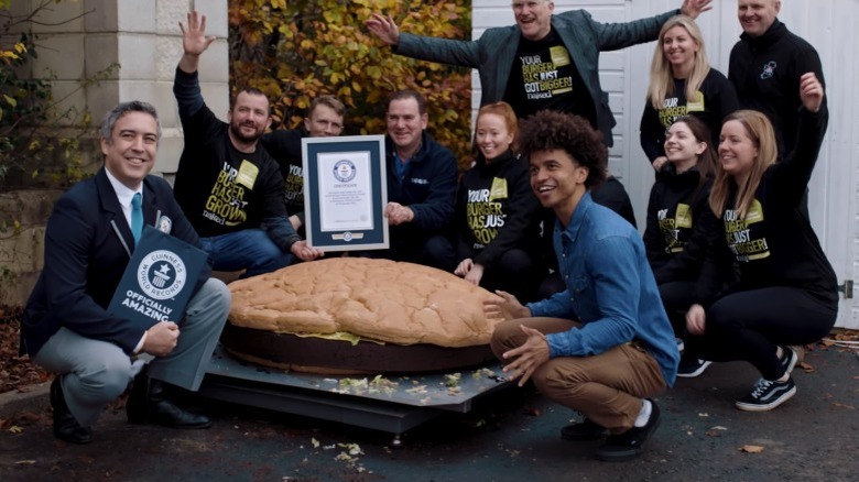 The team celebrates winning the record