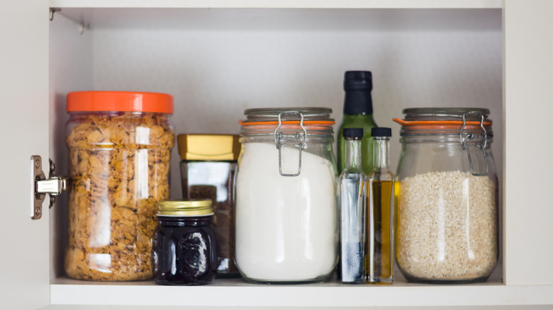 A collection of jars in a pantry
