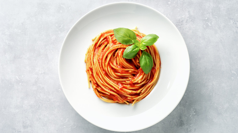 Tomato sauce and pasta in a bowl