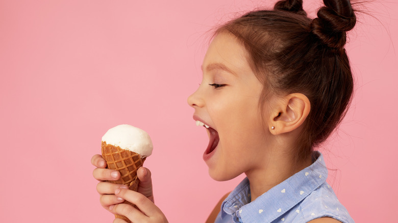 girl vanilla ice cream cone