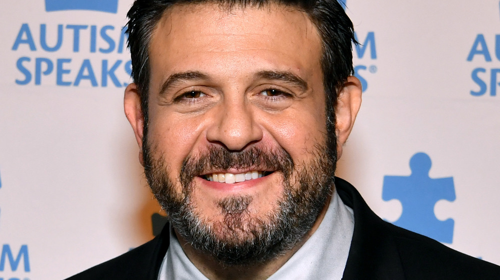 Adam Richman in suit and tie