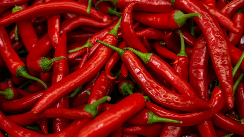 Red peppers stacked on each other