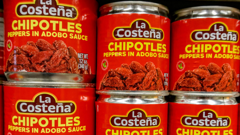 Cans of chipotle peppers in adobo sauce.