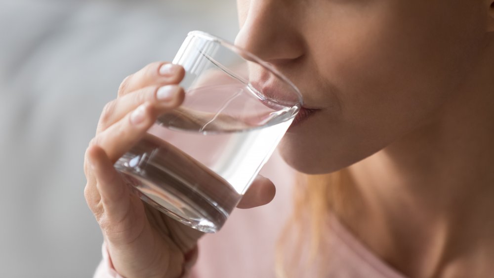 Woman drinking a glass of water