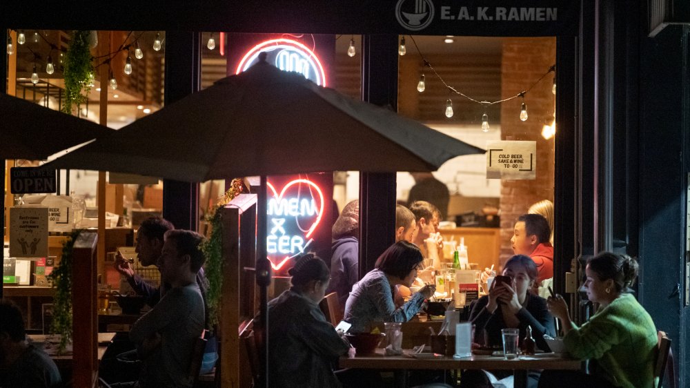 nighttime outdoor restaurant scene in New York City