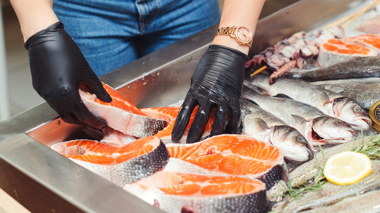 Raw fish steaks in ice