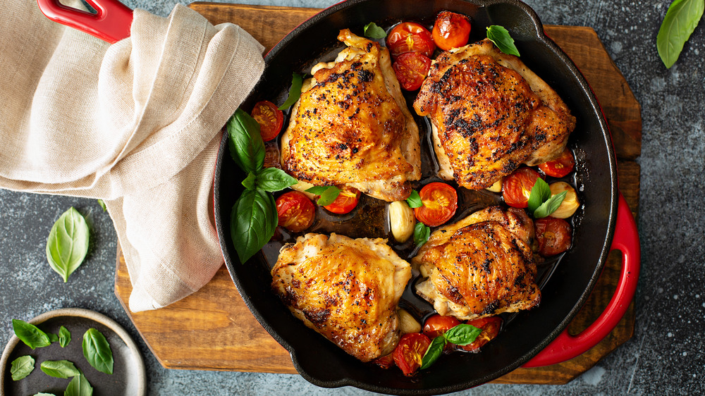 Chicken thighs in pan