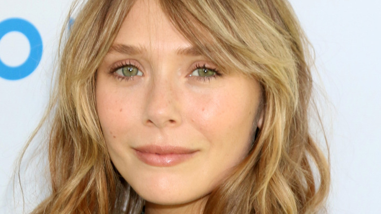 Headshot of Elizabeth Olsen on red carpet