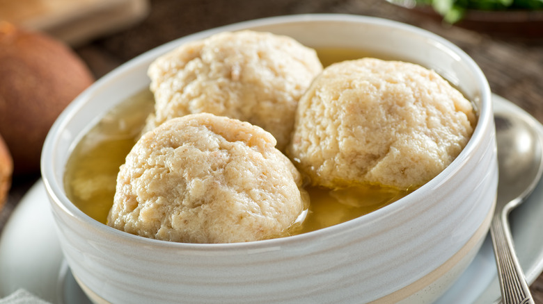 Matzo ball soup in a bowl