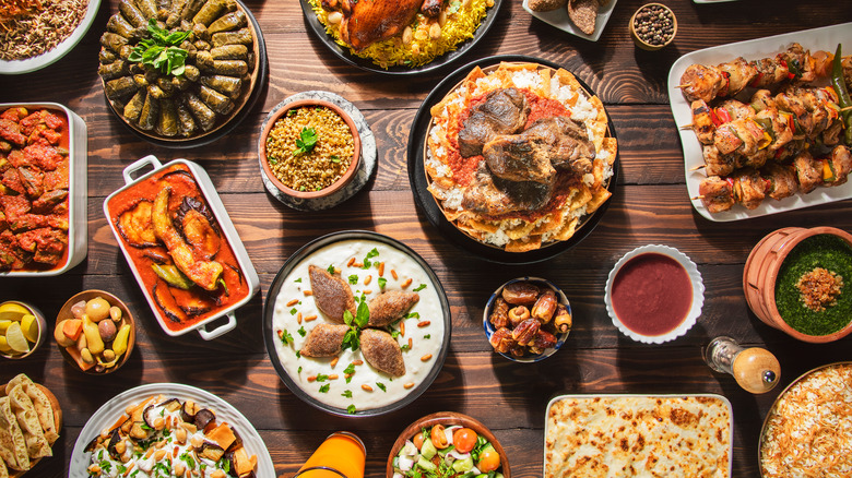 Middle Eastern food spread on wooden table