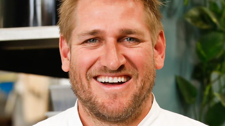 Curtis Stone grinning widely