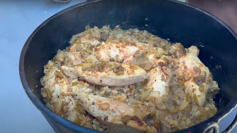 Chicken and rice casserole in a pot by Cowboy Kent Rollins