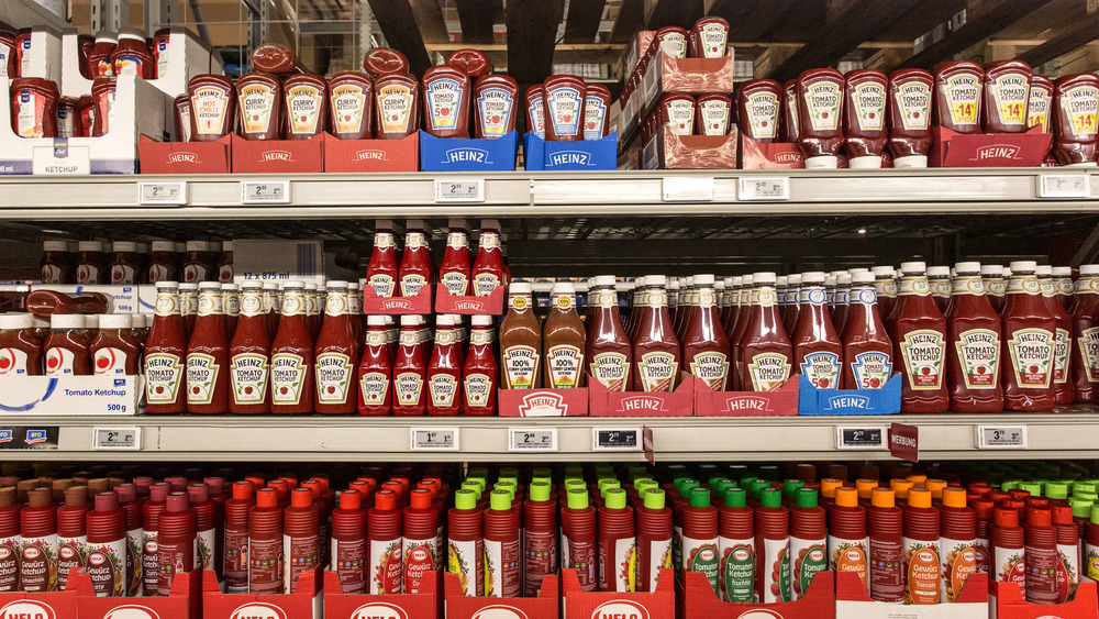 Rows of ketchup on store shelves 