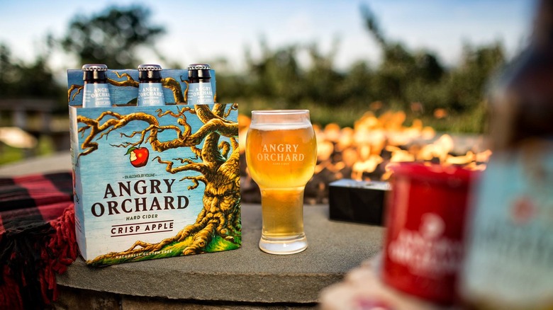 Angry Orchard cider on patio table