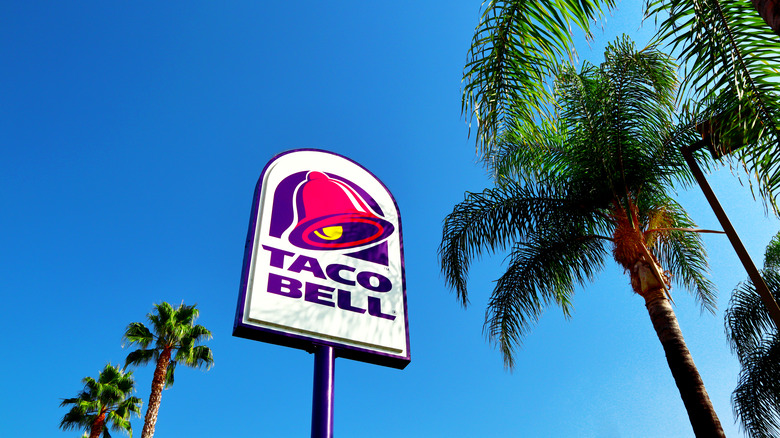 Taco Bell sign with palm trees