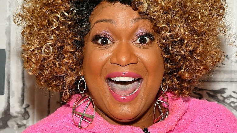 Sunny Anderson with wide smile