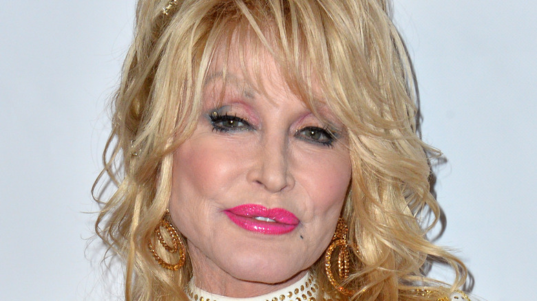 Dolly Parton with sparkly earrings