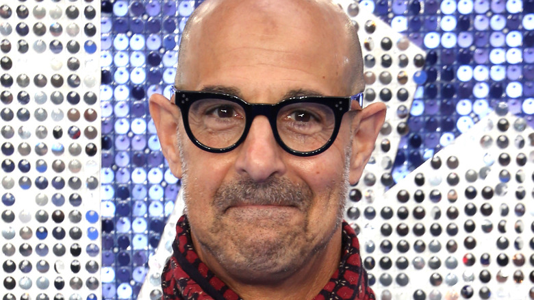 Stanley Tucci inward lip roll