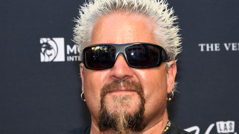 Guy Fieri closeup with shades on