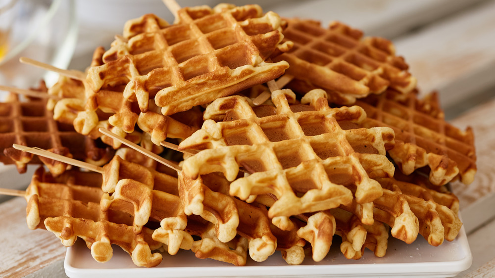 Waffles on sticks on a plate