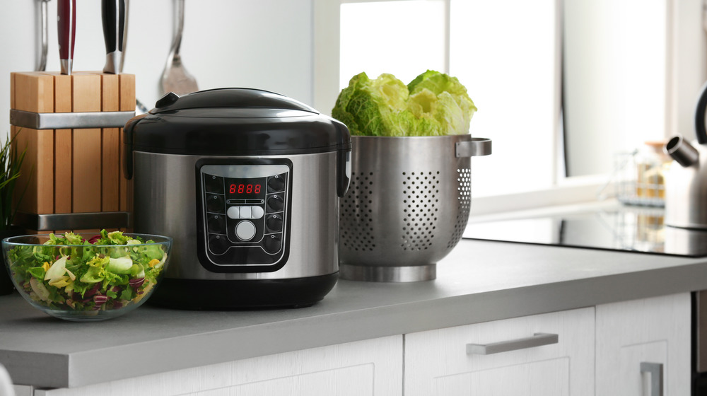 Slow cooker on kitchen counter