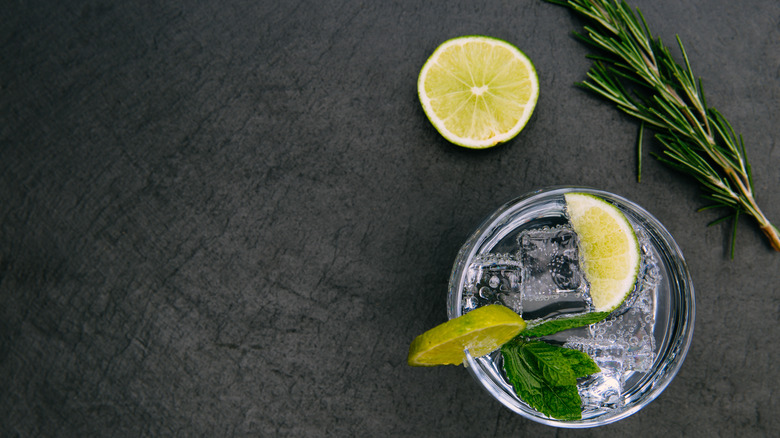 Tonic water with rosemary and lime. 