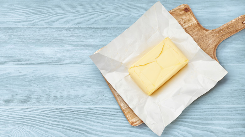 Butter on wooden board