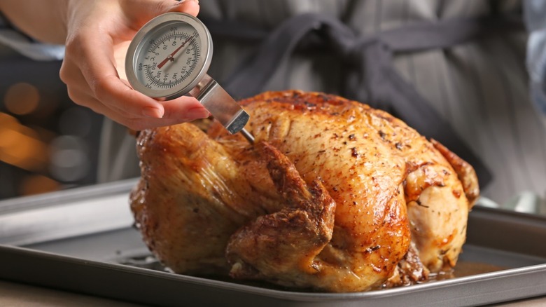 Meat thermometer in a roast chicken