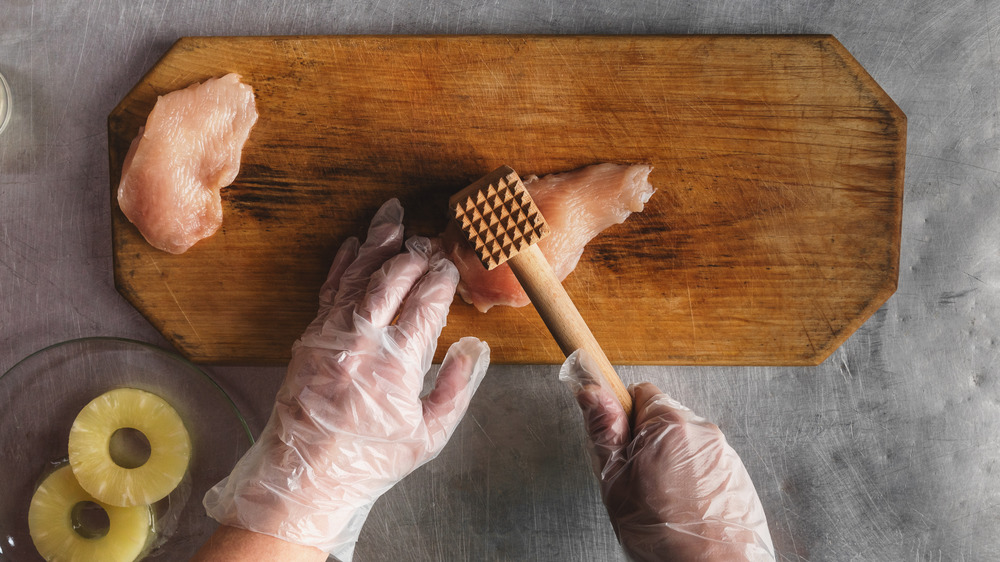 tenderizing chicken with mallet