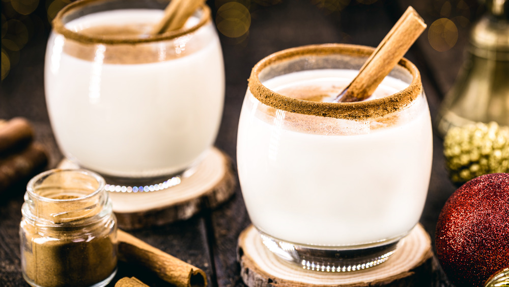 eggnog served with cinnamon sticks