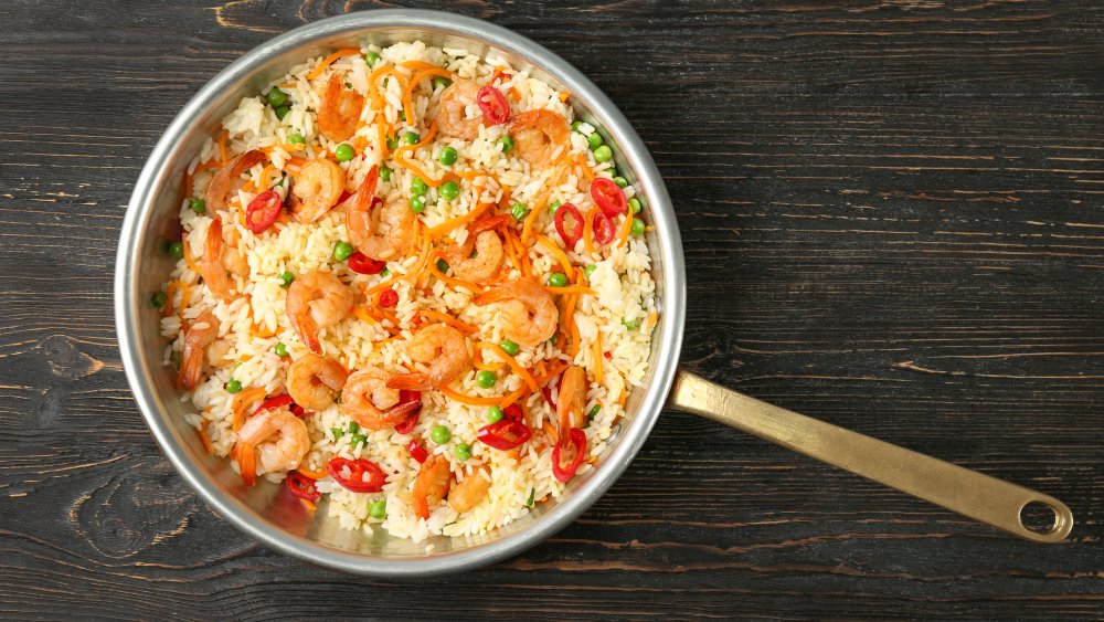 Well-cooked shrimp on fried rice.