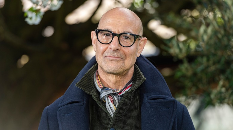 Stanley Tucci smiling at a public event