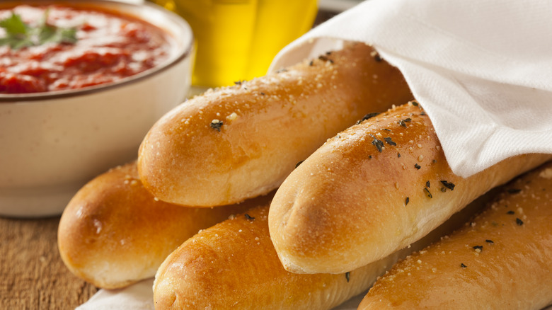 Breadsticks with marinara sauce and Italian spices