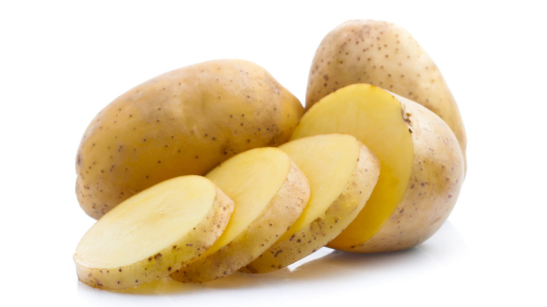 sliced and whole potatoes