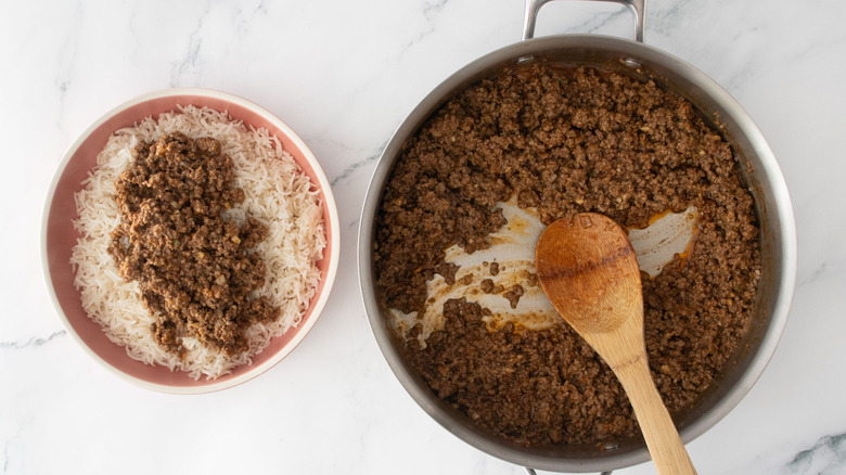 Keema rice bowl next to ground beef in pan