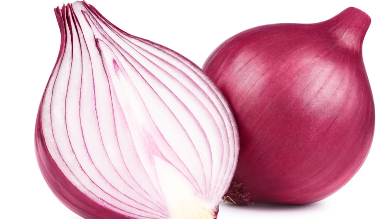 One half and one whole red onion